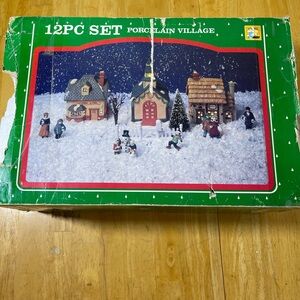 Vintage Franks nursery and crafts 12pc set lighted porcelain village 1990’s